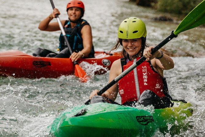 Best Guided Kayaking Tour in Soča Valley With Photos - Downriver Fun: Rapids, Games, and Emerald Soča Breaks
