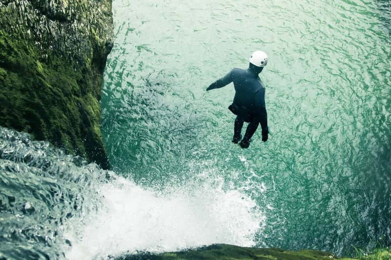 Bled: Triglav National Park Canyoning Adventure with Photos - Entering the canyon: slides, jumps, and abseiling