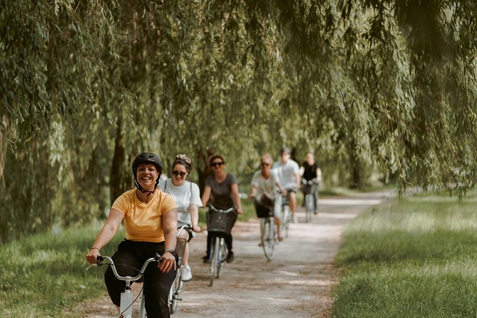 City Bike Tour Ljubljana - Meet at Petkovškovo nabrežje: bikes, helmets, and the small-group vibe