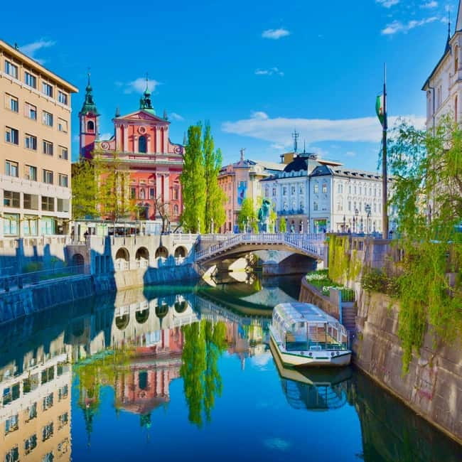 From Trieste: Ljubljana and Lake Bled Full-Day Bus Tour - Ljubljana on foot: from Ljubljanica riverside views to the Triple Bridge