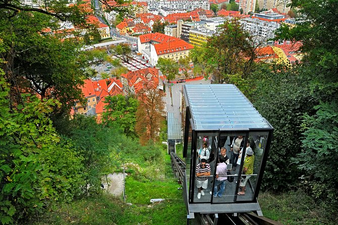 Guided Walk and Funicular Ride to Ljubljana Castle - Where you start at the Ljubljana Tourist Information Center and how the tour flows