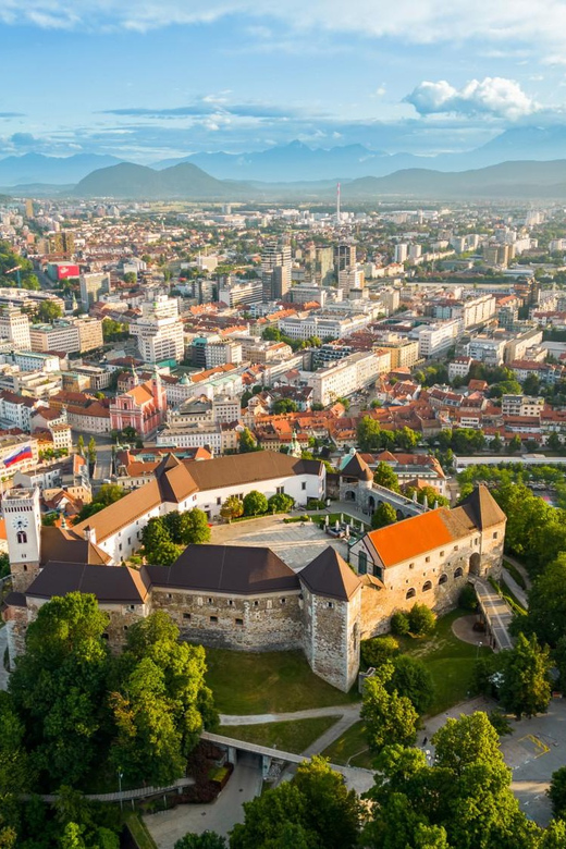 Ljubljana: 2h walking tour with local guide - Central Market Moment: Local Life, Even If You Skip Shopping