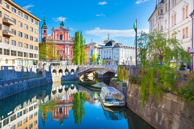 Ljubljana boat cruise and walking tour - Quick landmark stops that set the story: Prešeren, Franciscans, Town Hall