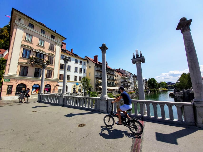 Ljubljana by E-Bike: Guided City Highlights Tour - Ljubljana Castle finale: the sunset view payoff