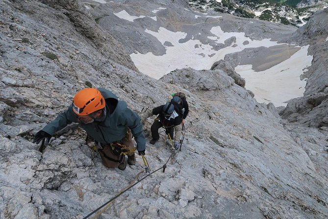 Mighty Mount Triglav Climb-summer Special-join Group - Day 2 summit push: ferrata harness setup, Aljaž Tower photo, then the descent