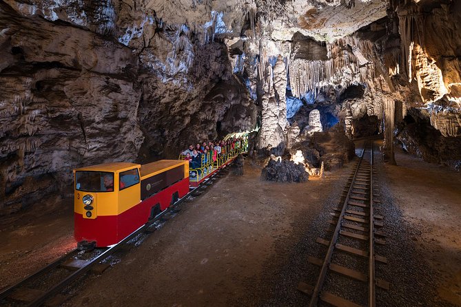 Postojna Cave & Predjama Castle - Small Group Tour from Koper - Predjama Castle on a Cliff: A Cave Fortress With Siege Drama