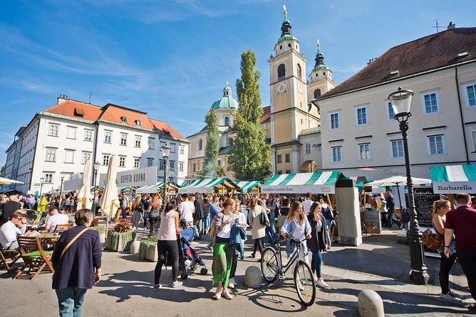 Private city tour of Ljubljana. 2 hours with a friendly and fun local guide. - Triple Bridge and Plecnik’s Covered Market, architecture you can feel