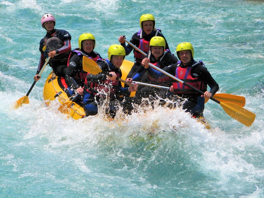 Slovenia: Half-Day Rafting Tour on Soča River with Photos - Emerald-pool swim breaks and optional jumps from rocks