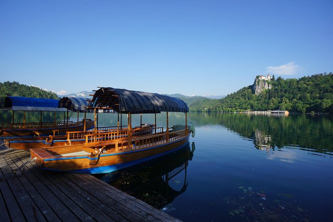 Slovenia in One Day: Lake Bled, Postojna Cave and Predjama Castle - Predjama Castle in a cliff: dark staircases and the legend of Erazem