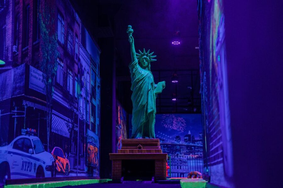 Woop! Glow golf: Ljubljana Btc City - Included ticket vs add-ons: socks and registration bracelet