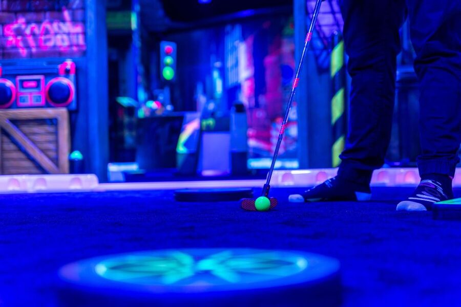 Woop! Glow Golf: Maribor - Your 15-Hole Ticket, Glow Gear, and Themed Props